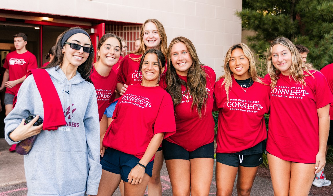 Students assist new students as they move into campus.